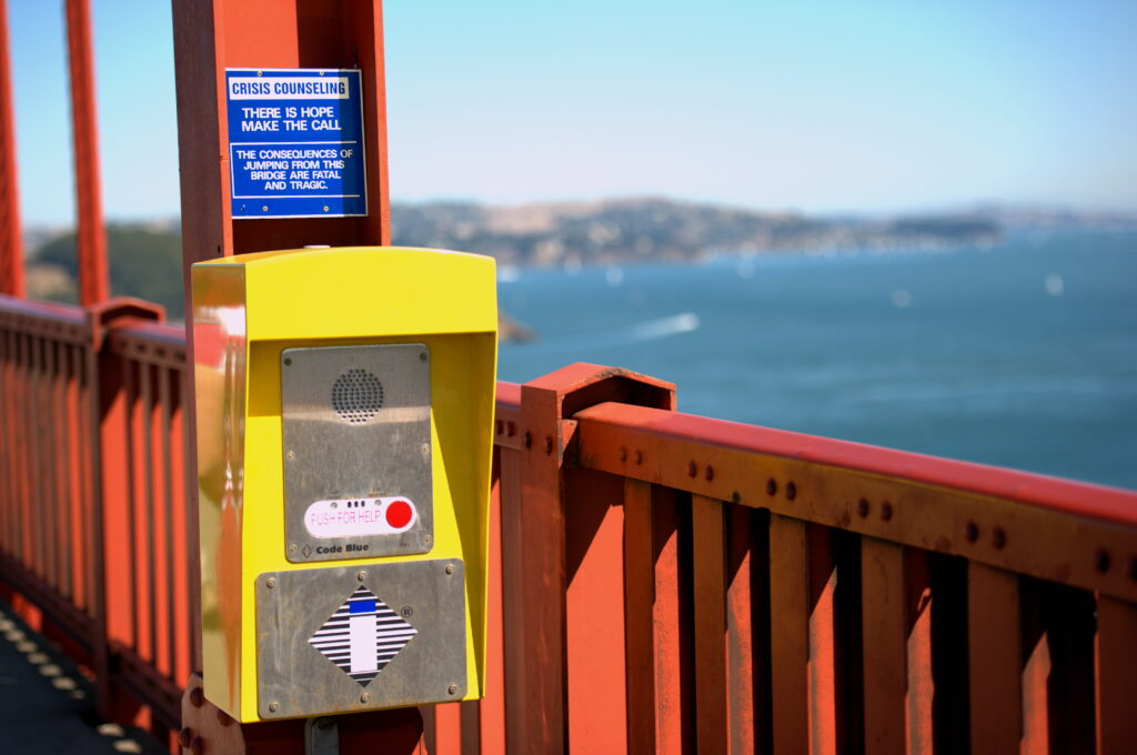 A sign warning against suicide on the Golden Gate Bridge.