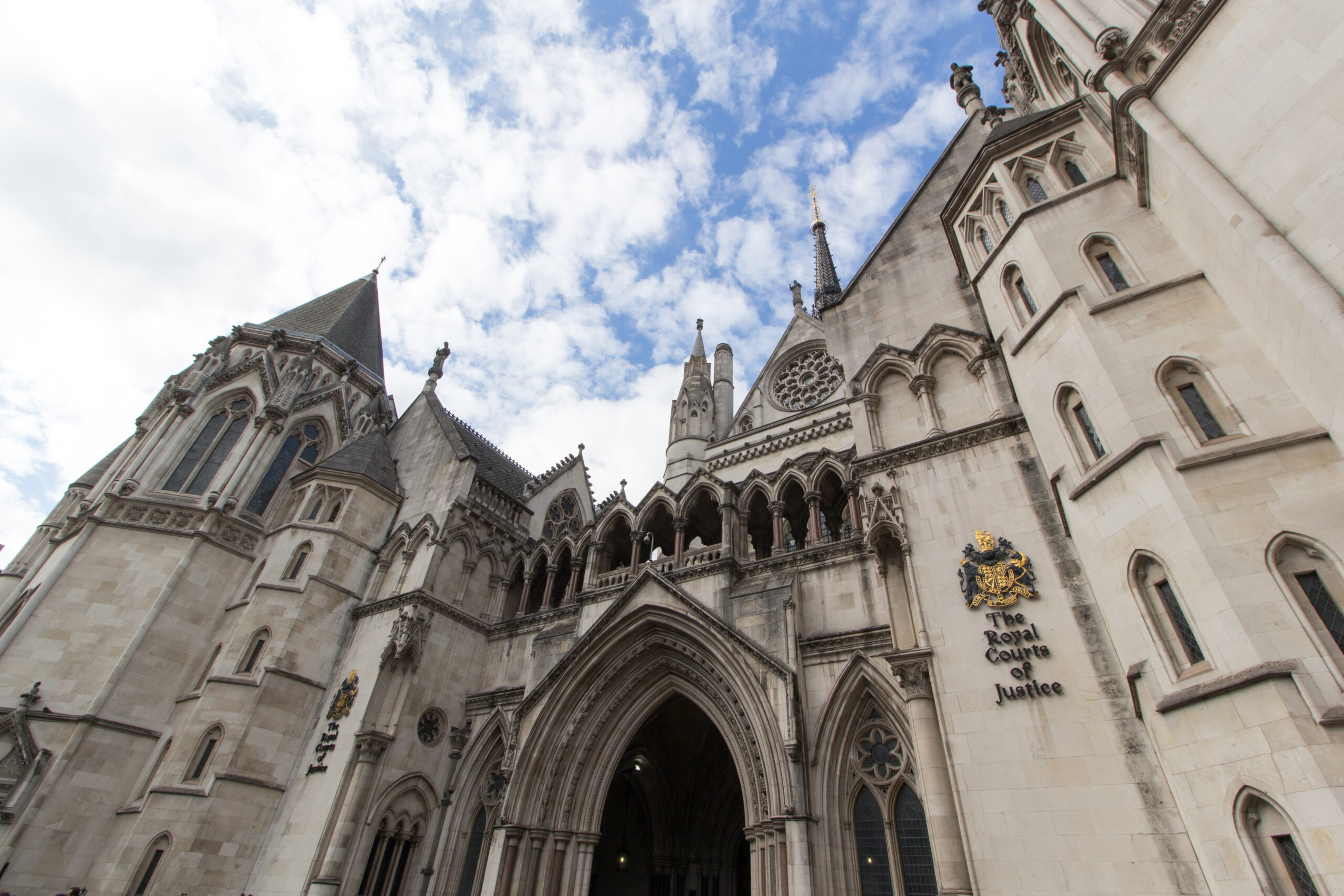 Image of the exterior of the Royal Courts of Justice in London.