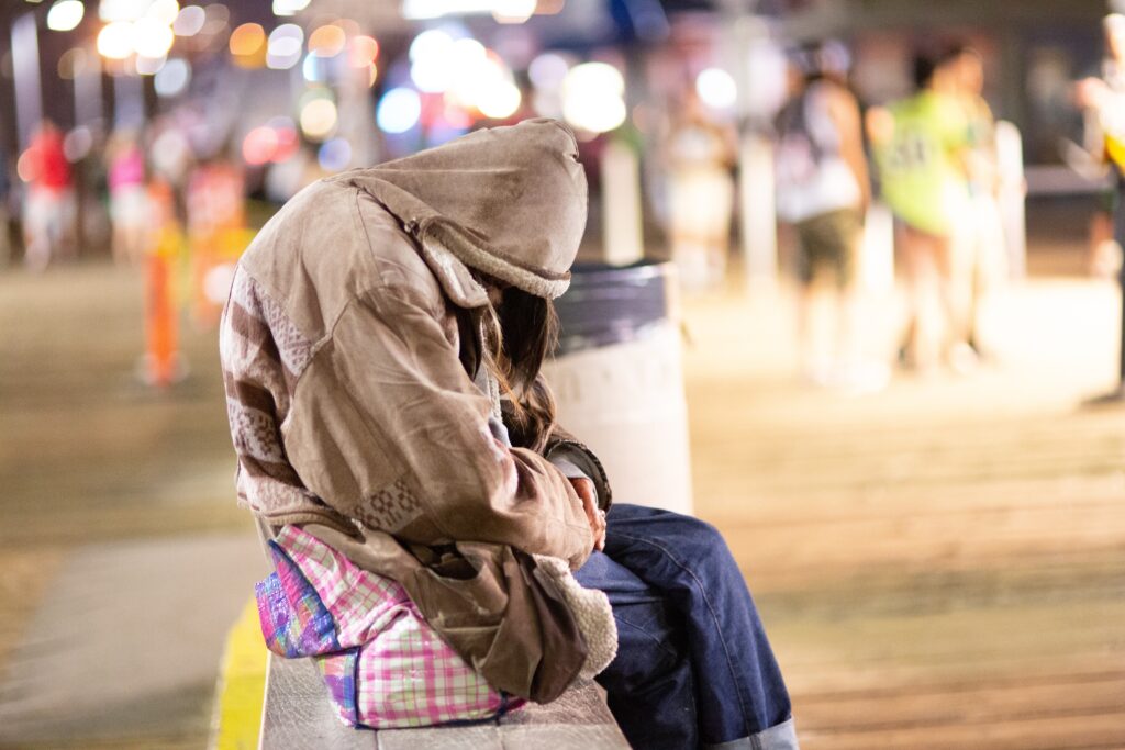 Homeless,Woman,Sitting,Alone,At,Night,,Feeling,Despair